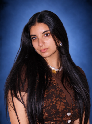 Ms. Nasrine Zahwi